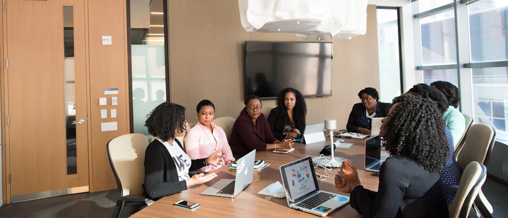 Colleagues working together in a meeting room